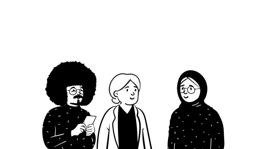 Drei Menschen tauschen sich aus.