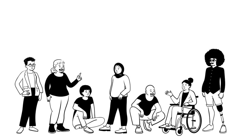 Große Gruppe von acht Menschen, sitzend und stehend, im gemeinsamen Austausch.